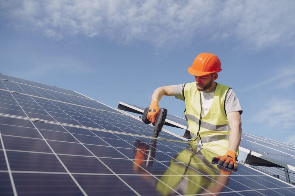 Solar Technician Installing Solar Panel